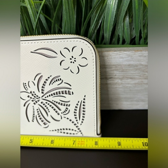 Kate Spade Cream Wristlet with Floral Cutouts - Picture 7 of 8